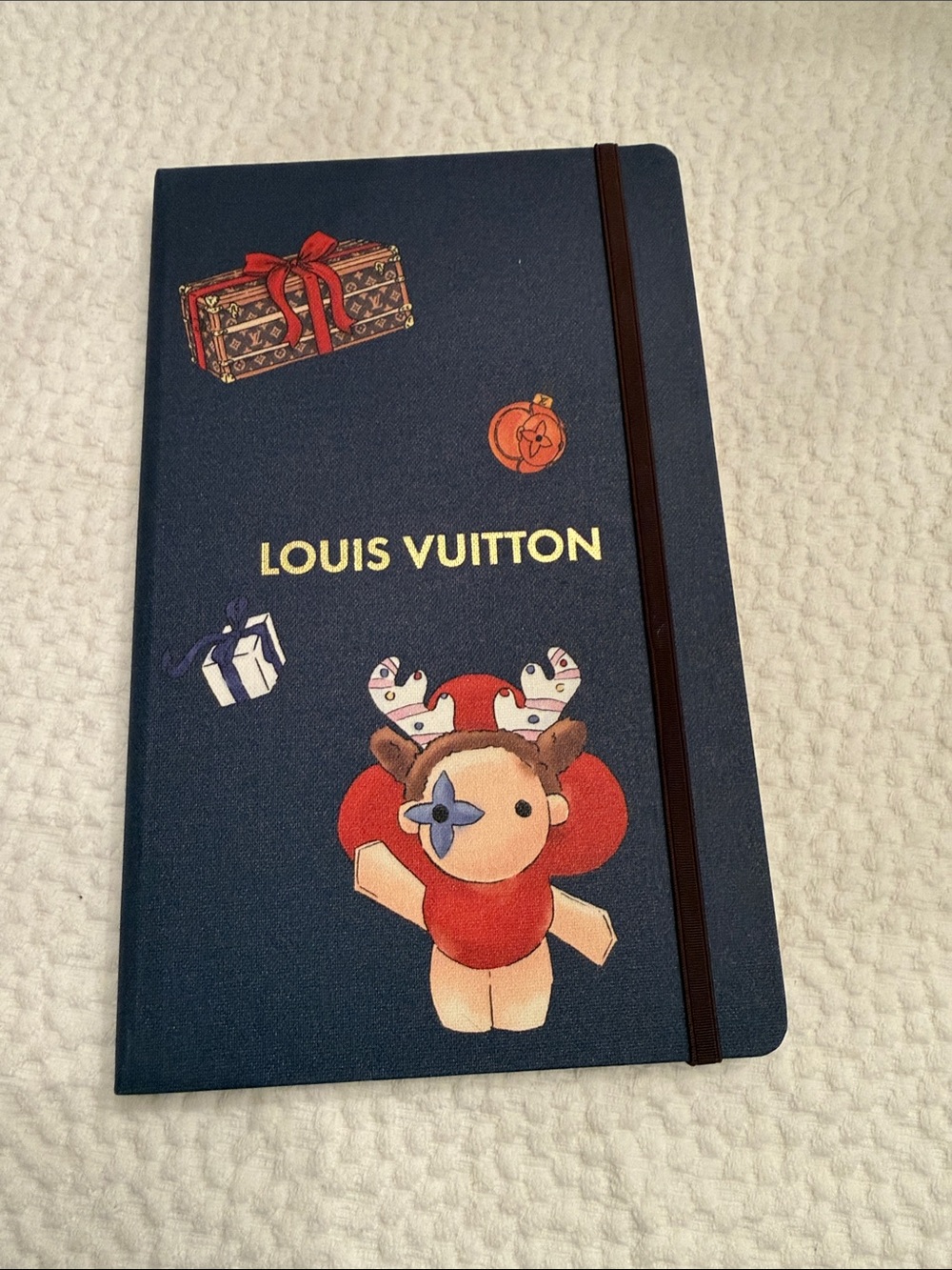 Louis Vuitton Navy Notebook with Festive Character Print Holiday 2025